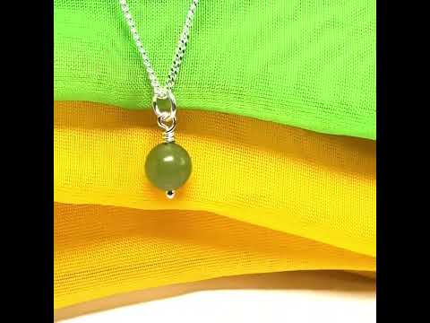 A gorgeous small real green gypsum necklace ball shaped, a really gorgeous round pendant with chain