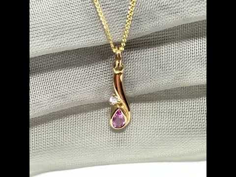 Real pink sapphire and diamond necklace yellow gold pendant with a chain included