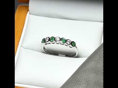 Video of A real emerald and diamond white gold eternity ring with smooth setting