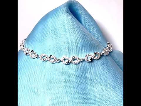 Sparkling infinity style shaped cubic zirconia sterling silver bracelet