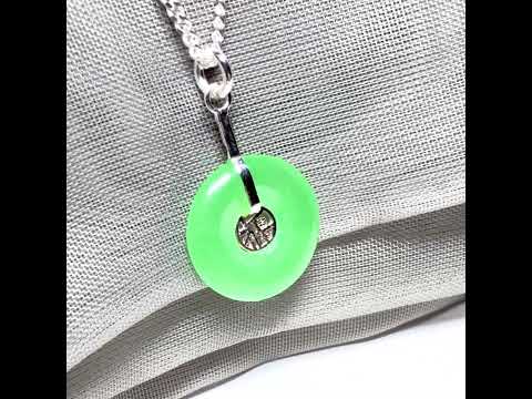 Real green jade necklace with a round pendant sterling silver and a chain