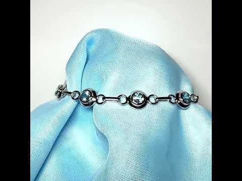 Real blue topaz fancy round link sterling silver bracelet