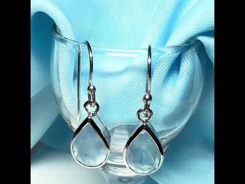 Video of a pair of real aquamarine drop earrings sterling silver pear or teardrop shaped