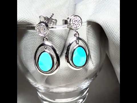 ideo of a pair of blue green turquoise oval sterling silver drop earrings double oval
