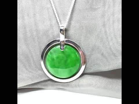 Large silver round shaped green real jade necklace pendant with a chain