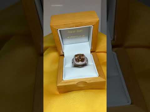 Large topaz coloured cocktail ring with decorated shoulders