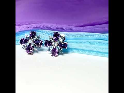 Video of Pair of real amethyst and real blue topaz fancy spray stud earrings