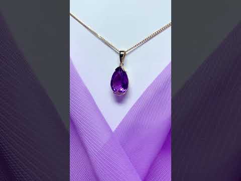Large pear shaped purple amethyst yellow gold necklace