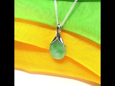 A really gorgeous real green jade pendant in a teardrop or pear shape, a really meaningful designed necklace