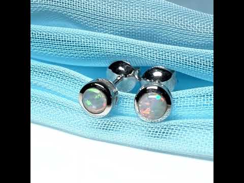 Pair of real opal earrings round white gold stud smooth rubbed over setting