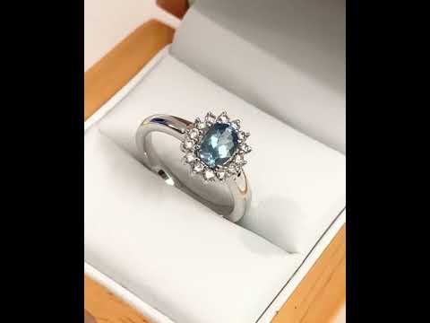 Real aquamarine white gold oval and diamond cluster ring