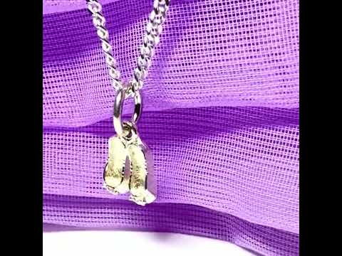 Video of Small ballerina slippers shaped sterling silver necklace