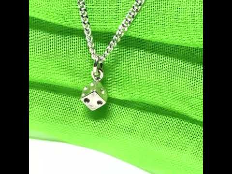 Video of a Small dice shaped sterling silver necklace with a chain included