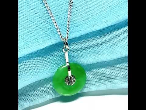 Real green jade necklace with a round pendant sterling silver and chain