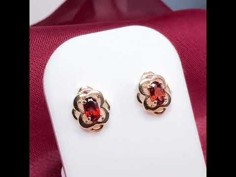 Yellow gold oval shaped real garnet stud earrings