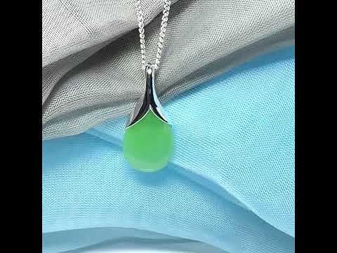 A real jade pendant in a teardrop shape or pear shaped designed green necklace with chain