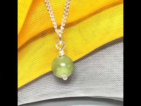 Small round 8.5 mm green real gypsum necklace ball shaped pendant with a chain