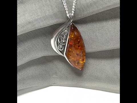 Real amber necklace sterling silver fancy half open pierced pendant design