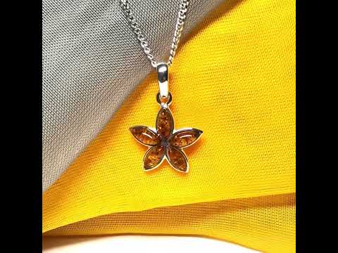 Real amber star shaped necklace sterling silver pendant