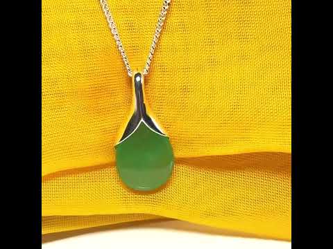 A real green jade necklace in a teardrop or pear shape with chain