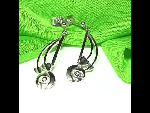 A video of a pair of ladies Charles Rennie Mackintosh drop earrings sterling silver