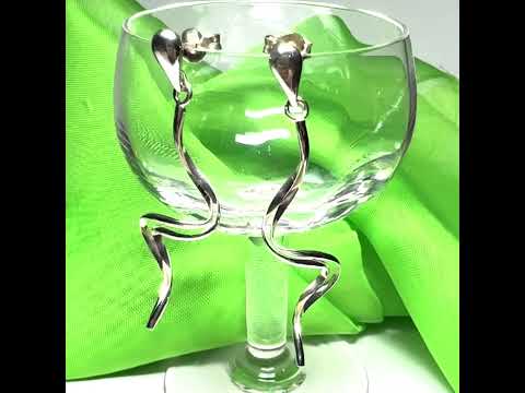Video of a pair of Ladies fancy swirl drop earrings sterling silver