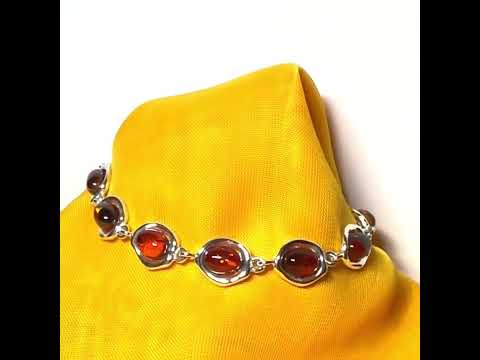 Real amber sterling silver fancy oval shaped bracelet