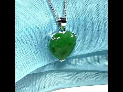 A real green jade necklace heart shape sterling silver with solid chain and box included as well