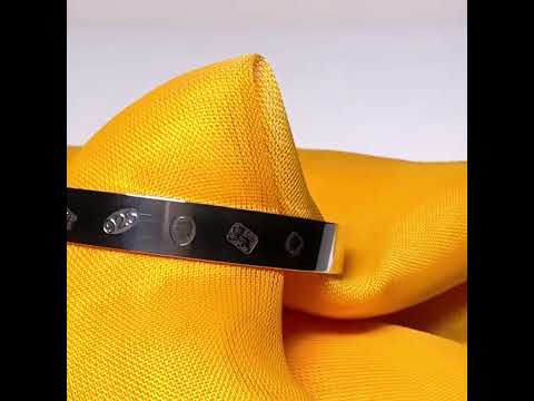 Video of a Childs small expanding bangle Hallmark feature designed sterling silver