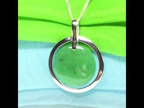 A large gorgeous sterling silver green real jade necklace halo style round pendant with chain