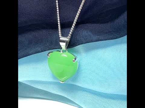 A really stunning real green jade necklace heart shaped sterling silver with chain included as well