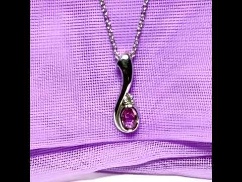Video of a Real pink sapphire and diamond pendant necklace white gold