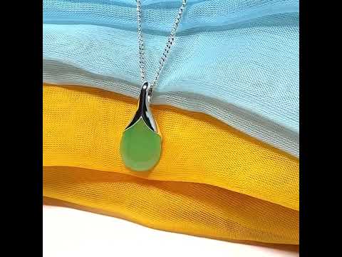 A real jade teardrop shaped designed green necklace or pear shape pendant