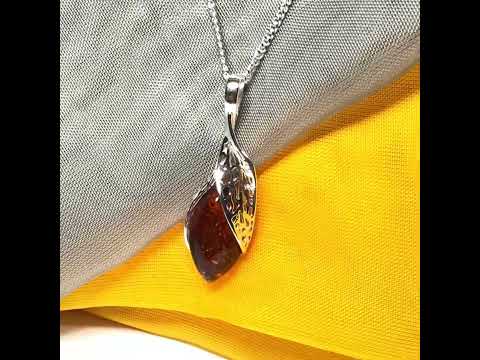 Real amber marquise sterling silver necklace with a swirl set fancy open pendant