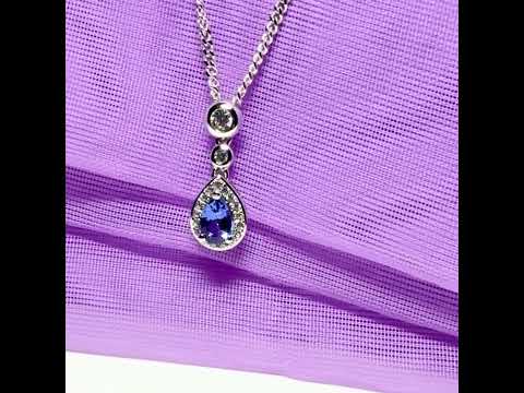 Video of a Real tanzanite and real diamond pear shaped necklace sterling silver pendant with a chain included