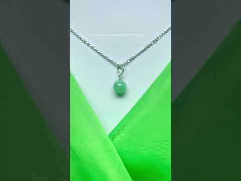 Video of a Small real green jade necklace round ball shaped pendant