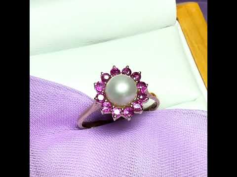 Video of a Cultured pearl and ruby yellow gold round cluster ring