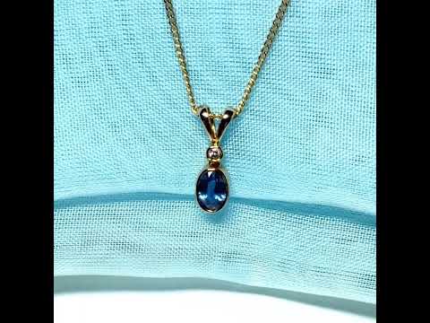 Yellow gold necklace real blue sapphire and diamond round and oval shaped pendant