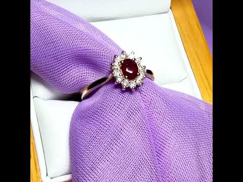 Video of a Oval Red Ruby And Real Diamond Yellow Gold Cluster Ring