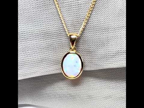 Real opal necklace yellow gold oval pendant smooth rubbed over smooth setting