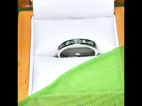Video of a Green Real Emerald And Diamond White Gold Eternity Ring Channel Setting