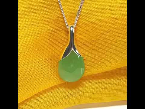 A stunning real green jade necklace in a teardrop, a timeless designed pendant and chain included