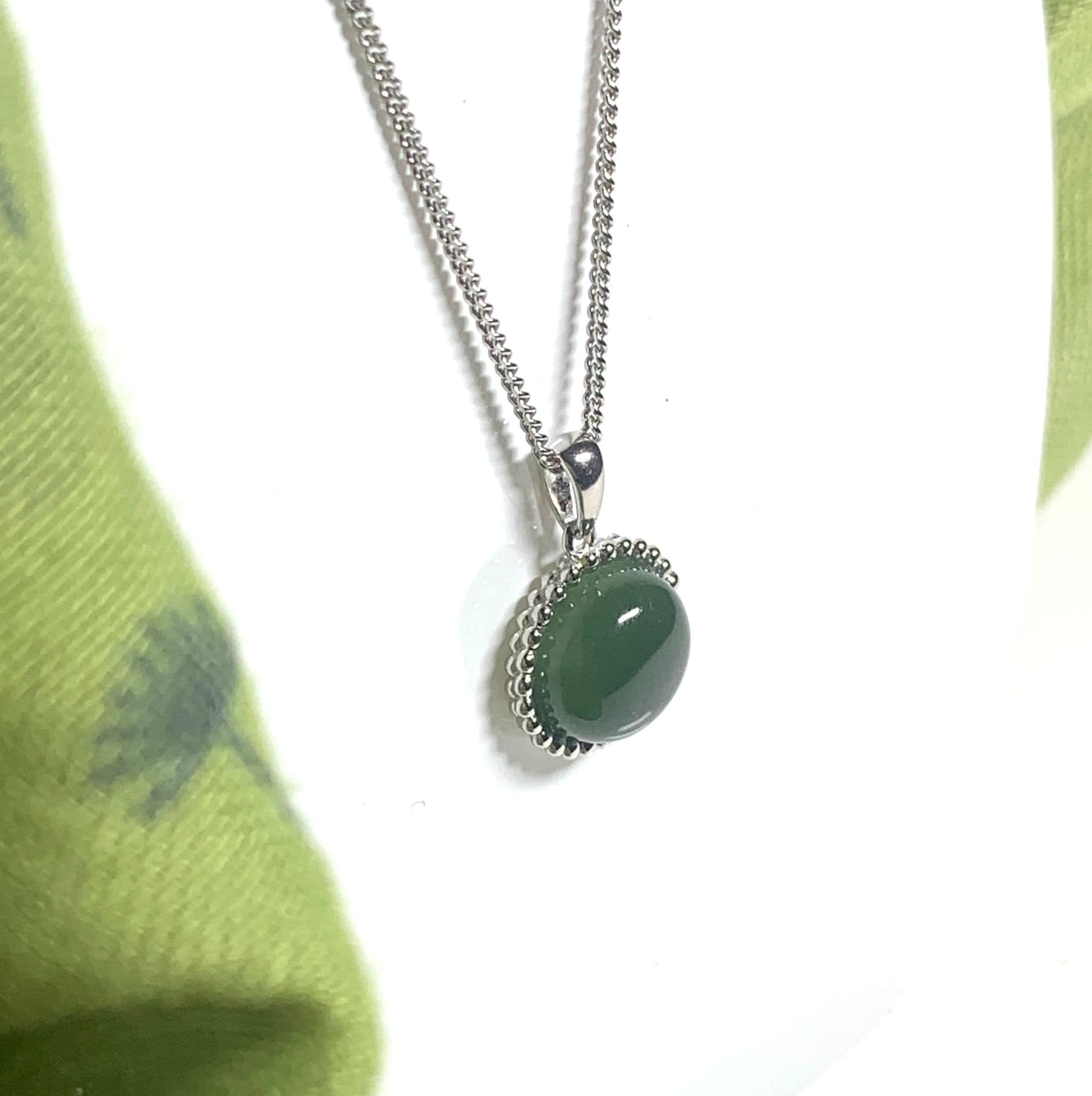 Round green jade patterned bobbled necklace sterling silver pendant