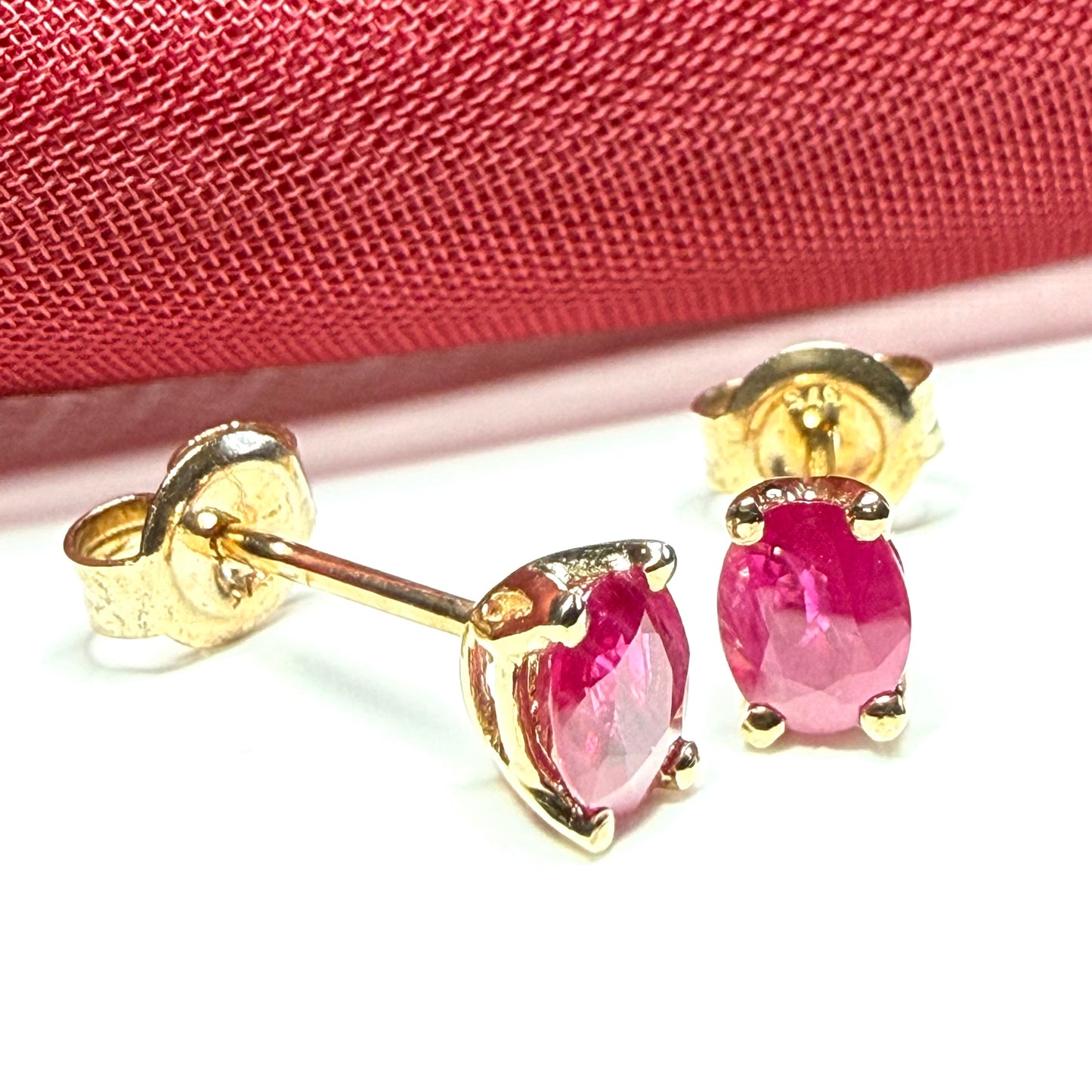 ruby oval yellow gold earrings