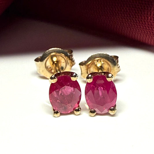 ruby oval yellow gold earrings