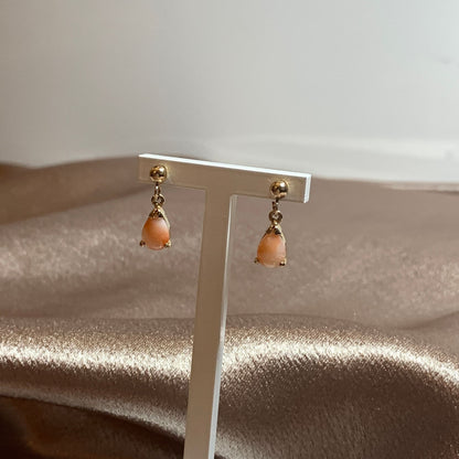 Teardrop pear shaped coral yellow gold drop earrings