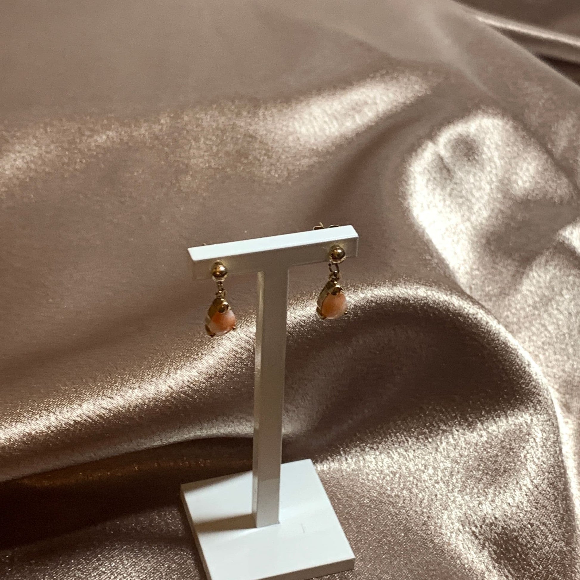 Teardrop pear shaped coral yellow gold drop earrings