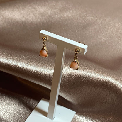 Teardrop pear shaped coral yellow gold drop earrings