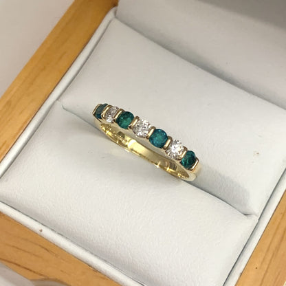 Tension Bar Set Emerald And Diamond Yellow Gold Eternity Ring