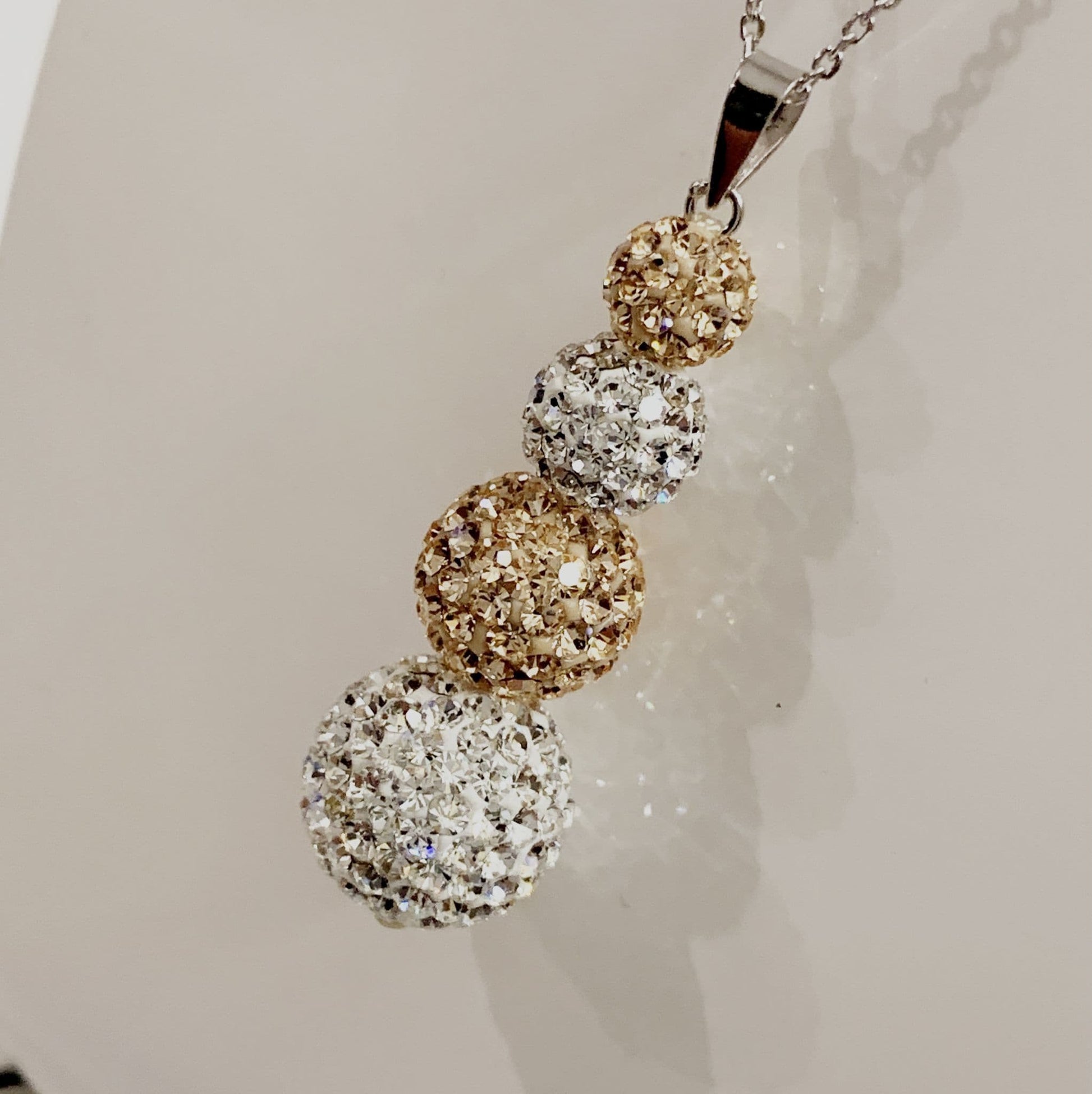 Tresor Paris White and Gold Crystal Necklace Pendant